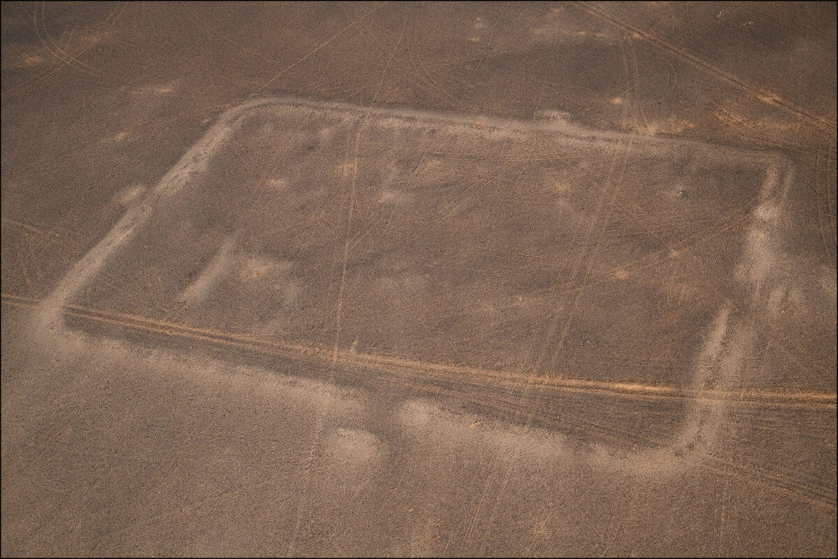 Oblique aerial view of the central camp, from the east. Possible rectilinear internal divisions are visible on the left side of the enclosure